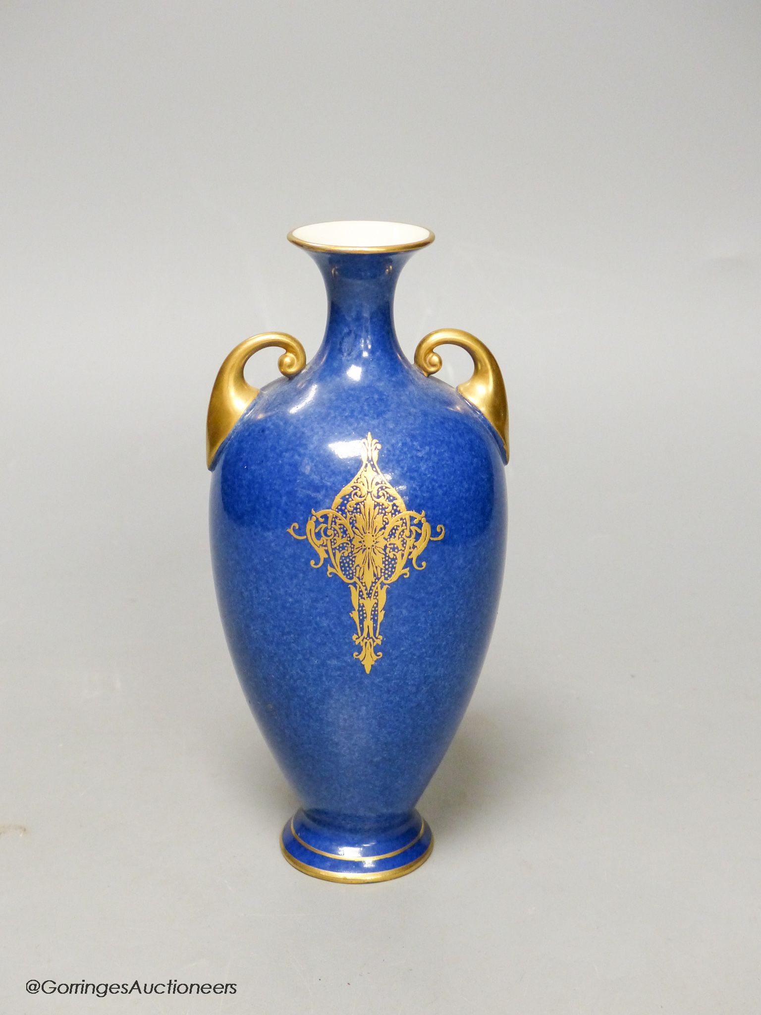 A Royal Worcester fruit painted powder blue vase, height 16.5cm